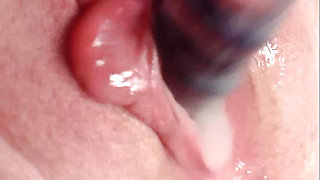 Granny with a big clit and wet pussy has an intense orgasm