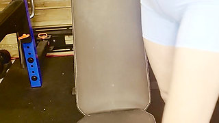 Horny MILF works out her wet pussy in the gym