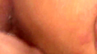 Brunette enjoys fisting with pretty lesbian