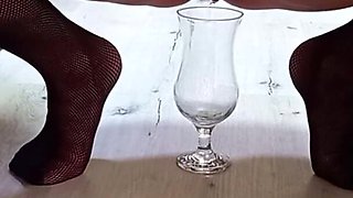 A glass of pee from a mature sexy woman