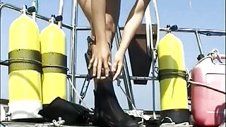 Sub girl lets her friend punish her on his boat