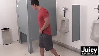 Hardcore action happening for Tobias in the public toilet