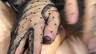 Mistress in Gloves Dominates Guy with Footjob in Nylon Socks