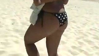 Woman pickup on the beach