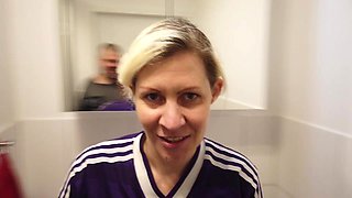 Blonde Sporty MILF Pisses in a Cup Wearing a Sports Jersey, Then Her Man Drinks the Piss