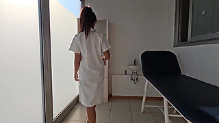 Sexy Doctor Masturbates on the Bed While Waiting for Her Patient