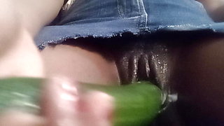 Close-up cucumber insertion