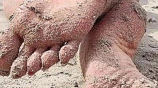 Covered in Sand and Above It All