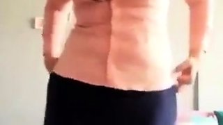 Turkish Arab in Hijab and Turban Performs a Striptease
