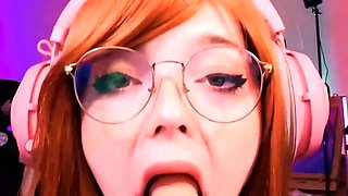 Amateur redhead Jacqueline with glasses masturbates