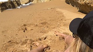 blonde with big natural boobs smokes naked on the public beach