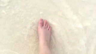 Running my bare feet on the white beach sand by the ocean.