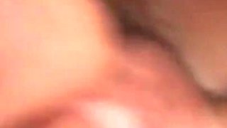 Amateur on the bed at home rubs her hairy pussy