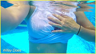 Horny mature wife goes braless for a swim, flashing her perfect tits in a wet white t-shirt