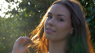 Nasty cute young girl loves to masturbate outdoor