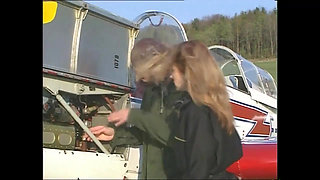 An Aviator Hungry for Pussy Bangs a Hot Redhead on the Grass