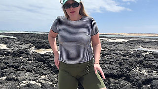 Girl Peeing in Yoga Pants on Beach