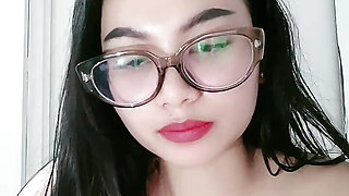 Woman wearing cleavage glasses