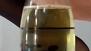 I Pee Into a Bottle Through a Funnel