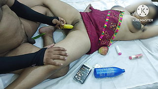 Inserting bottle banana into Indian girl pussy