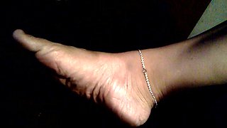 Mexican wife dangles feet