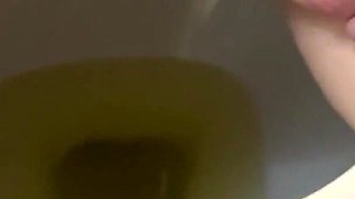 She pees in the toilet beautiful beautiful golden shower on toilet