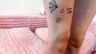 Small titted brunette Sharron with glasses masturbates