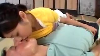 Asian woman squeezes milk from tits