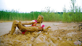 Orgasm in lake of mud - masturbating in clay