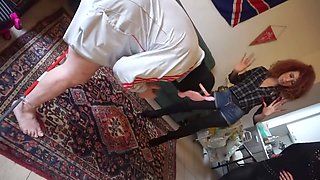 Dominating female kicks balls of her submissive pig