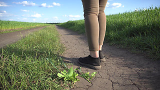 Sexy MILF Walks Outdoors and Teases Cute Panty Lines