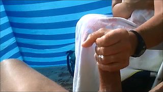 Compliation of Beach tugjob and large cumshots