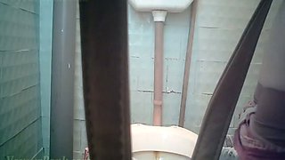 Pale skin lady filmed on hidden voyeur camera in the toilet