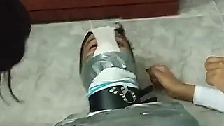 Latino Hunk Heavily Mummified by Cooperative Femdom Women