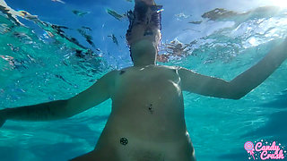 petite teen nude in the swimming pool