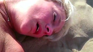 Mature Blonde Masturbating at the Beach