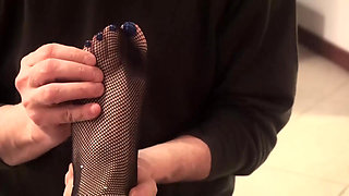 Foot massage by a slave