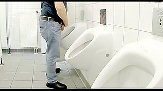 Truckers pissing in autohof toilet