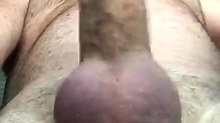 Playing with my hard cock.