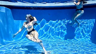 Pool is the perfect place for Cory Chase and Melanie Hicks to have fun