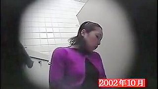 Voyeur in a public toilet exposing cunt playing