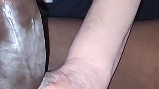 Mature Cocksucker Eats a Black Cock