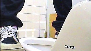 Cute amateur asian web cam girl playing with her toy