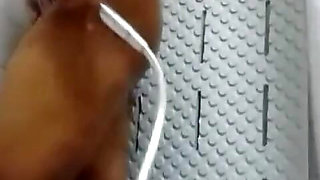 Sexy stepmom takes a shower while cumming in the bathroom