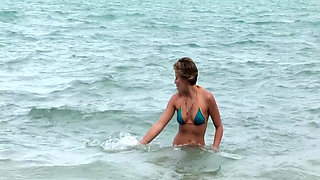 Grab your binoculars! Ava is stripping nude and frolicking