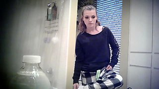 Beautiful teen puts her slim body on display on hidden cam