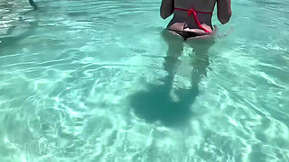 Cum to the pool with me wearing a micro bikini and showing my perfect body