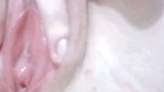 her white and clean pussy masturbating with her fingers inside it until she moans