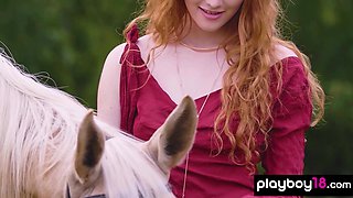 Redhead Latvian diva reveals her boobs