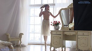 Stunning nude ballerina Annett A warms up for a shoot and strikes poses without a bra